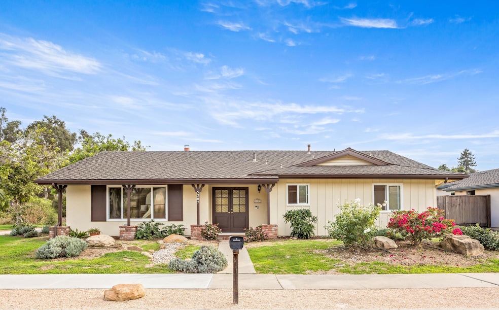 Front with colorful landscaping