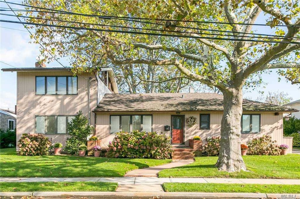 139 Sunset Ave, Island Park, NY 11558 - photo 1