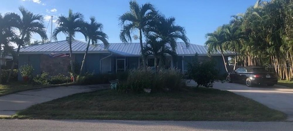 House Front. New Metal roof