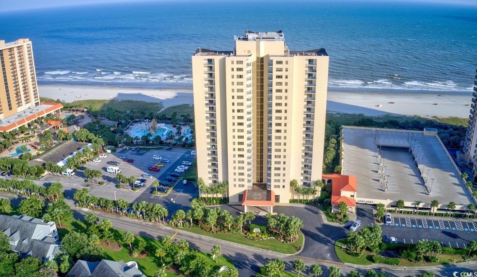 Aerial view with a water view and a view of the be