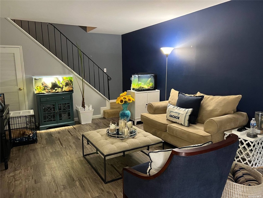 123 Storm Dr unit 123, Holtsville, NY 11742 - photo 1