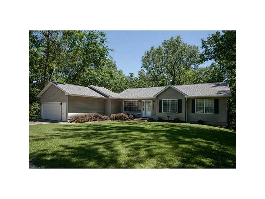 Front Exterior. Beautiful ranch on a wooded lot.