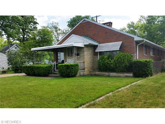 Come on in and see this fabulous 1960's sprawling brick ranch!