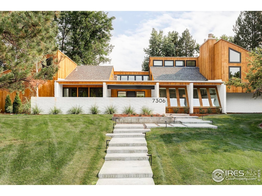 Welcome to 7306 Island Cir! Situated in one of Boulder's most desirable neighborhoods, this thoughtfully designed, fully updated home pairs high-end finishes with expansive indoor-outdoor living and exceptional privacy.