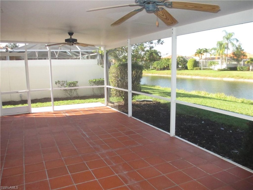Covered screened patio with lake views