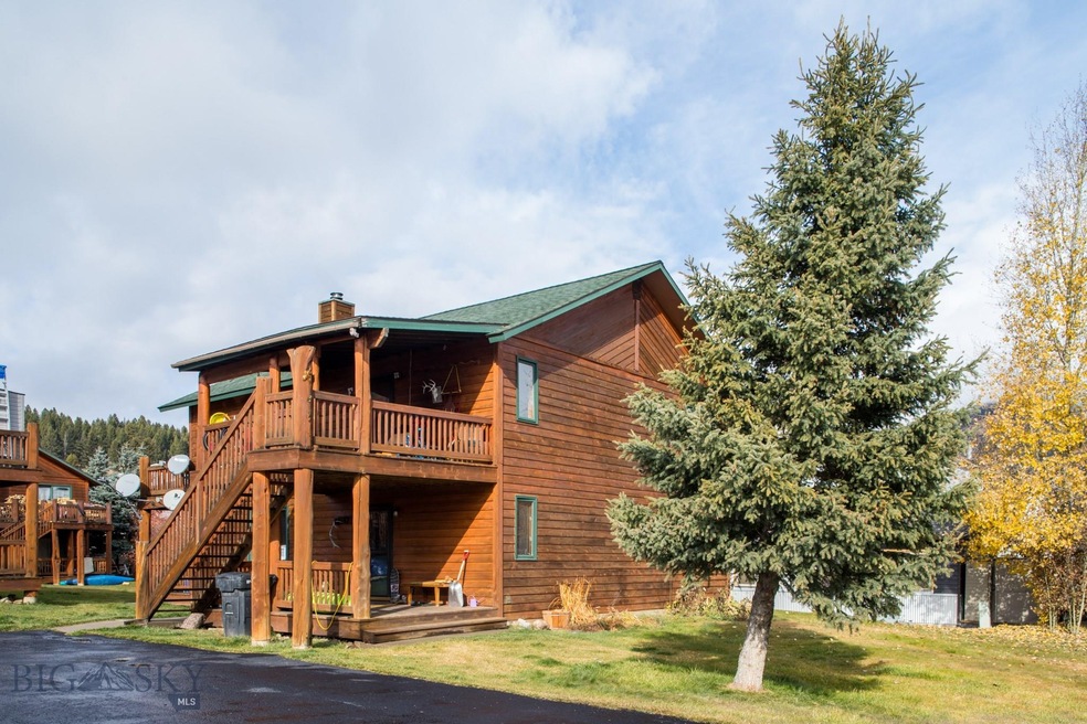 149 Juniper Berry Dr unit E, Big Sky, MT 59716 - photo 1