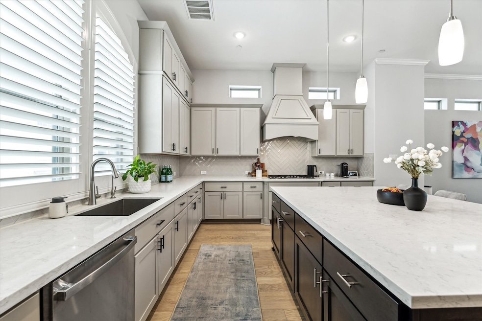 Another view of the spacious kitchen with single b