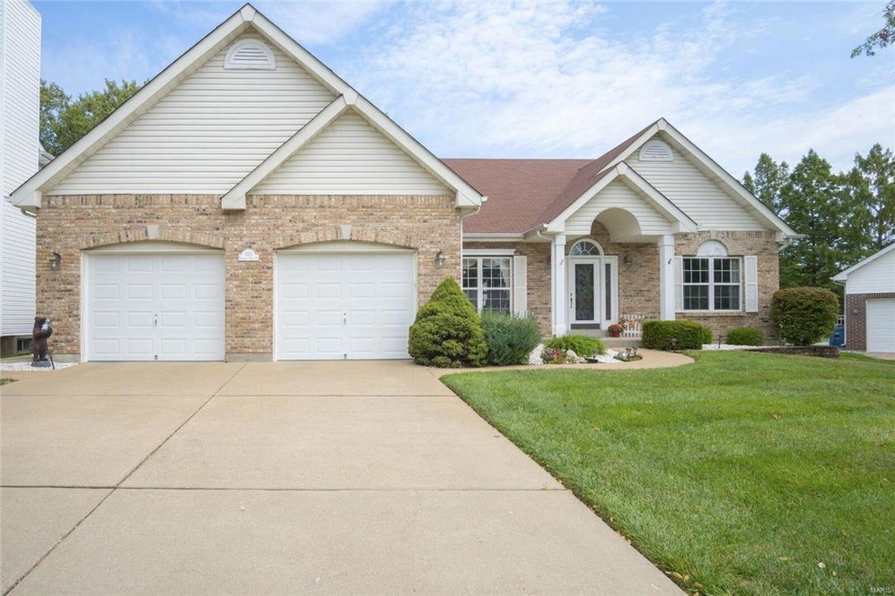 Located on circle of court and long drive allows for plenty of parking...Garage is 24' wide