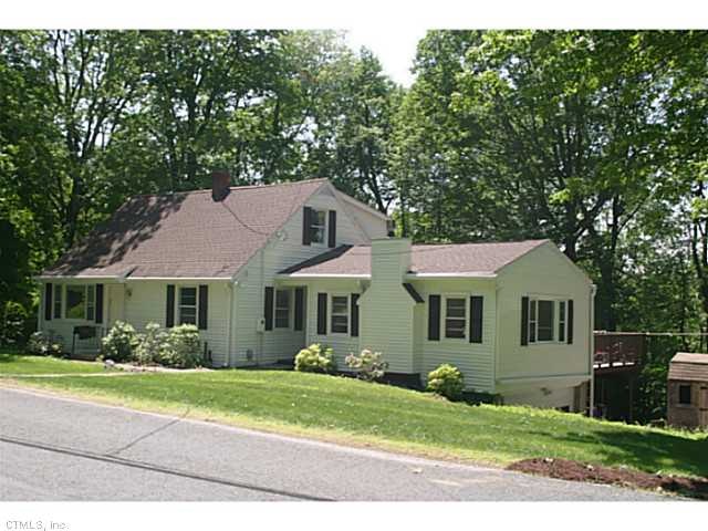 Exterior Front. located on a nice, wide country ro