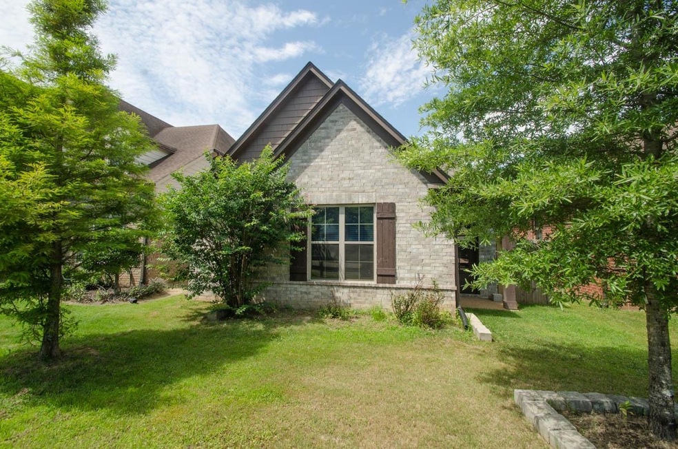 Exterior space with a yard