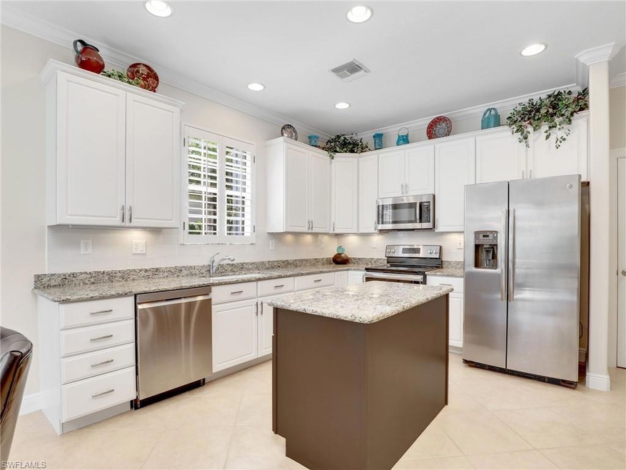 12839 Carrington Cir unit 102, Naples, FL 34105 - photo 1