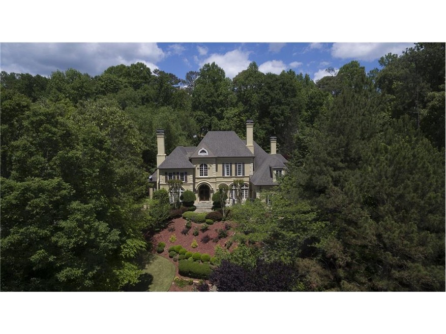 Luscious, private setting, this home is located in