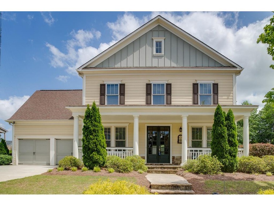 Front of home features expansive front porch.