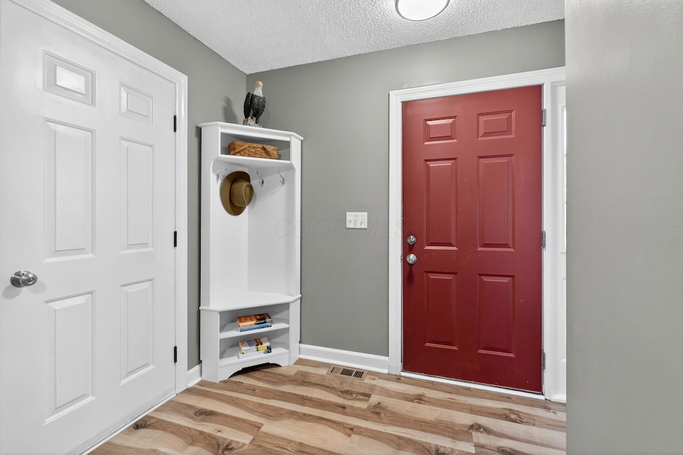 5500 Valencia Park Blvd unit 1E, Hilliard, OH 43026 - photo 1