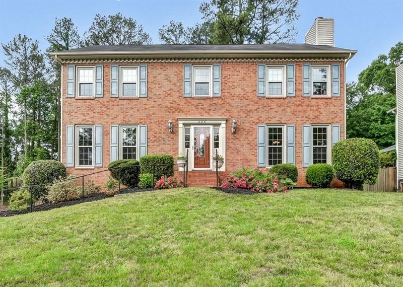Beautiful Brick Front Traditional Home in the Hear