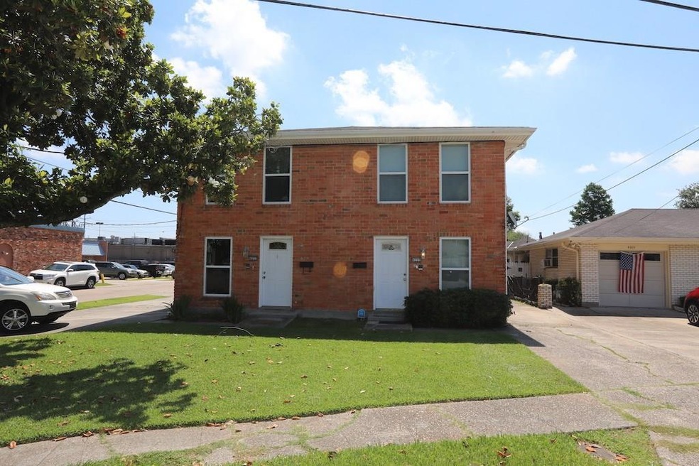 Front view of large double has a pitched roof and