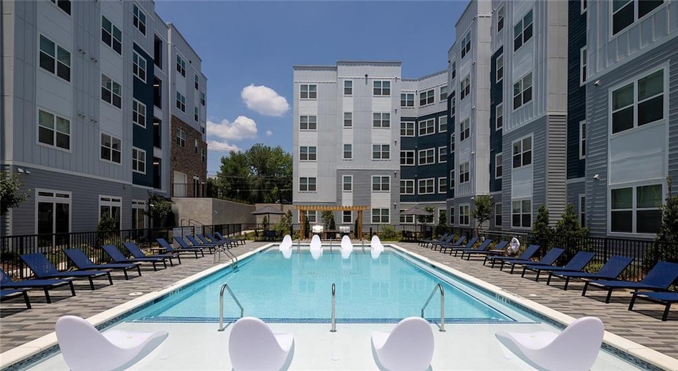 Community pool featuring a patio area