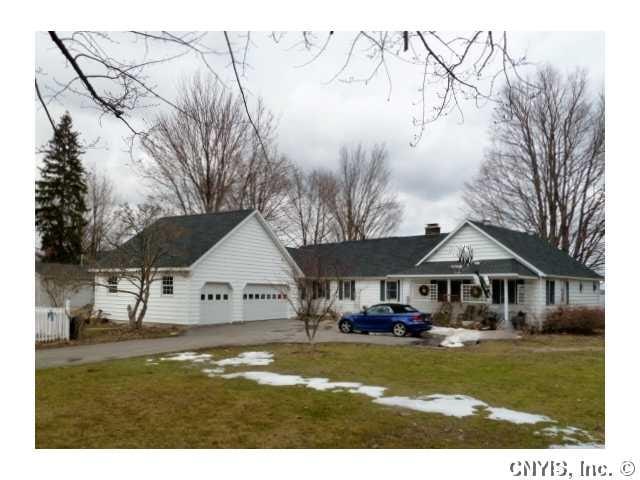 Exterior Front. Sprawling Ranch/Capecod with king-