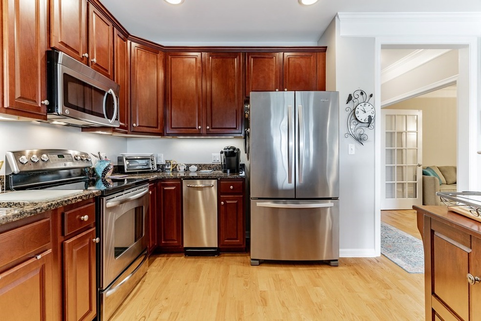 Wellington Crossing unit 404, Waltham, MA 02452 - photo 1