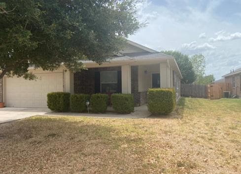 View of front of property with an attached garage