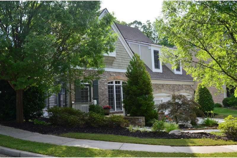 Exterior Front. Custom model home in an enclave of