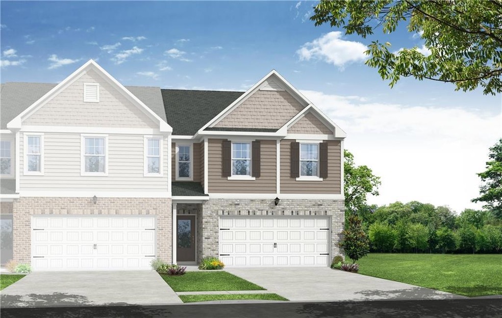 View of front facade featuring a front lawn and a 