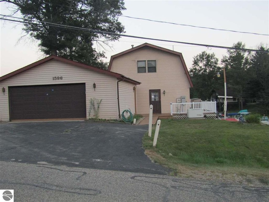 1586 N Ogemaw Trail, West Branch, MI 48661 - photo 1