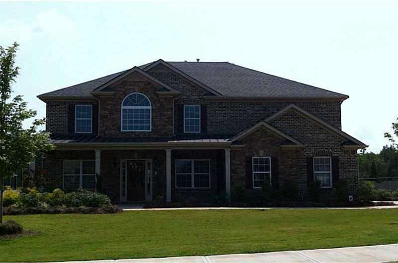 Exterior Front. The beautiful Oakwood plan with sp