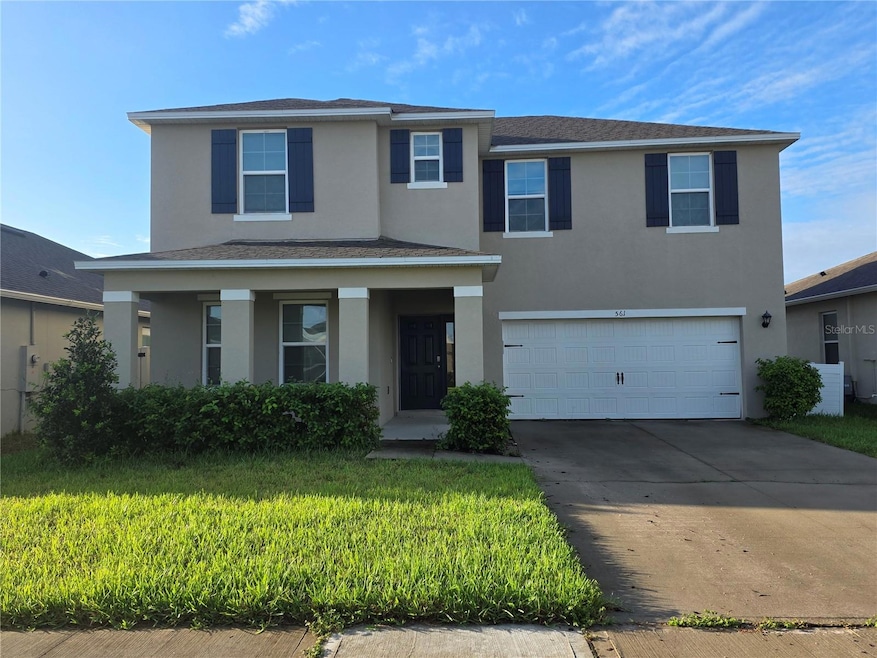 561 Talisi Loop, Saint Cloud, FL 34771 - photo 1