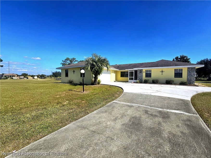 111 Revson Ave, Sebring, FL 33876 - photo 1