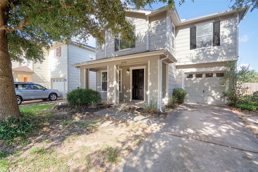 29707 Roland Orchard Ct, Spring, TX 77386 - photo 1
