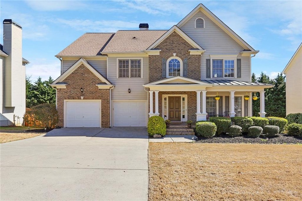 Meticulously maintained traditional home with welc