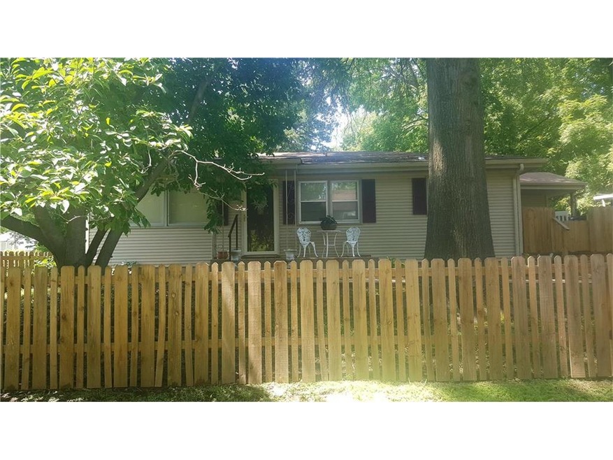 Front View of home with privacy fence