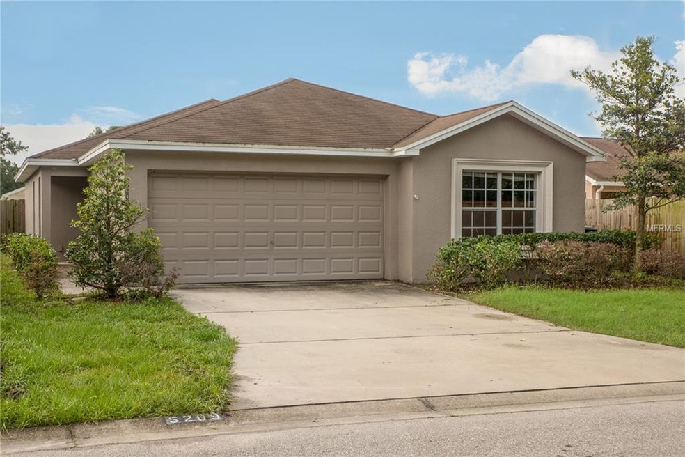 Front elevation with side entry front door