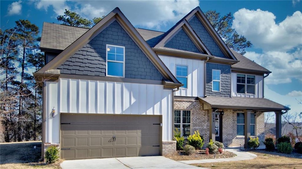 Craftsman-style home featuring a garage