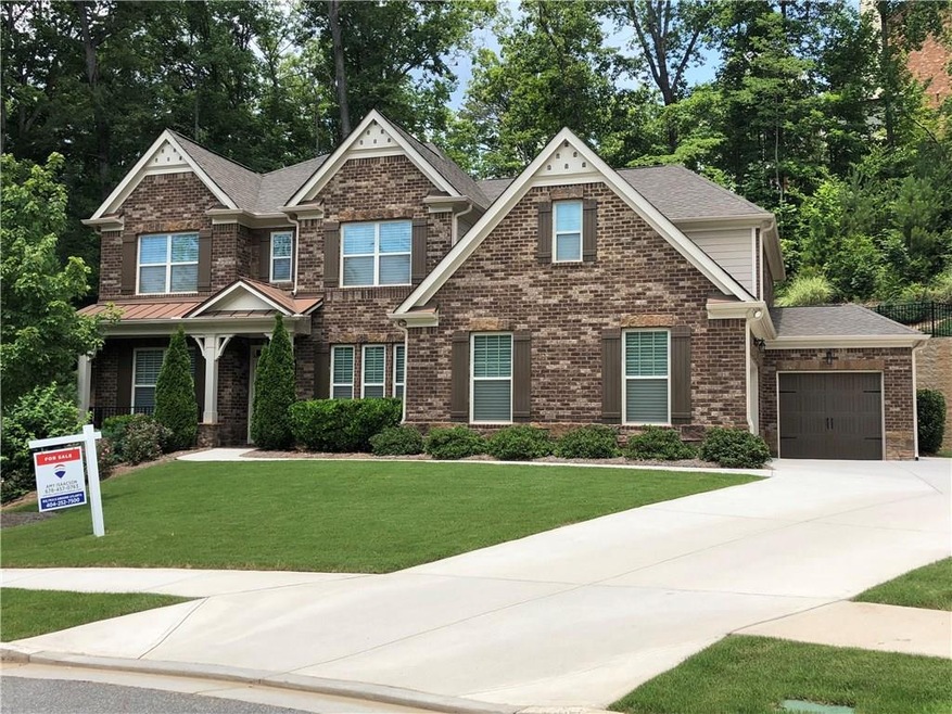Beuatiful brick home with 3 car side entry garage 