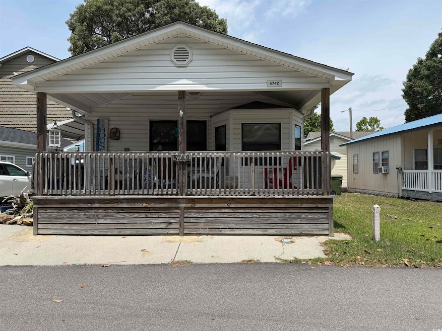 View of front of home featuring covered porch
