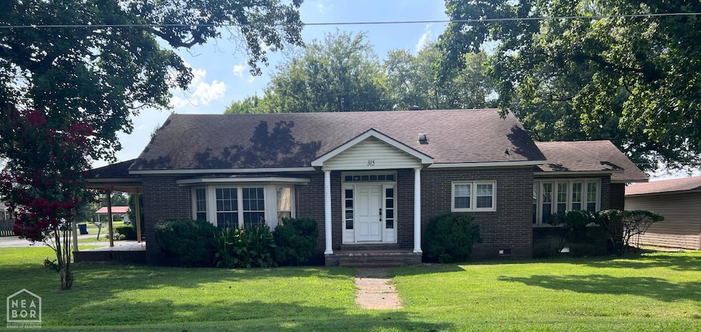 315 S Main St, Leachville, AR 72438 - photo 1