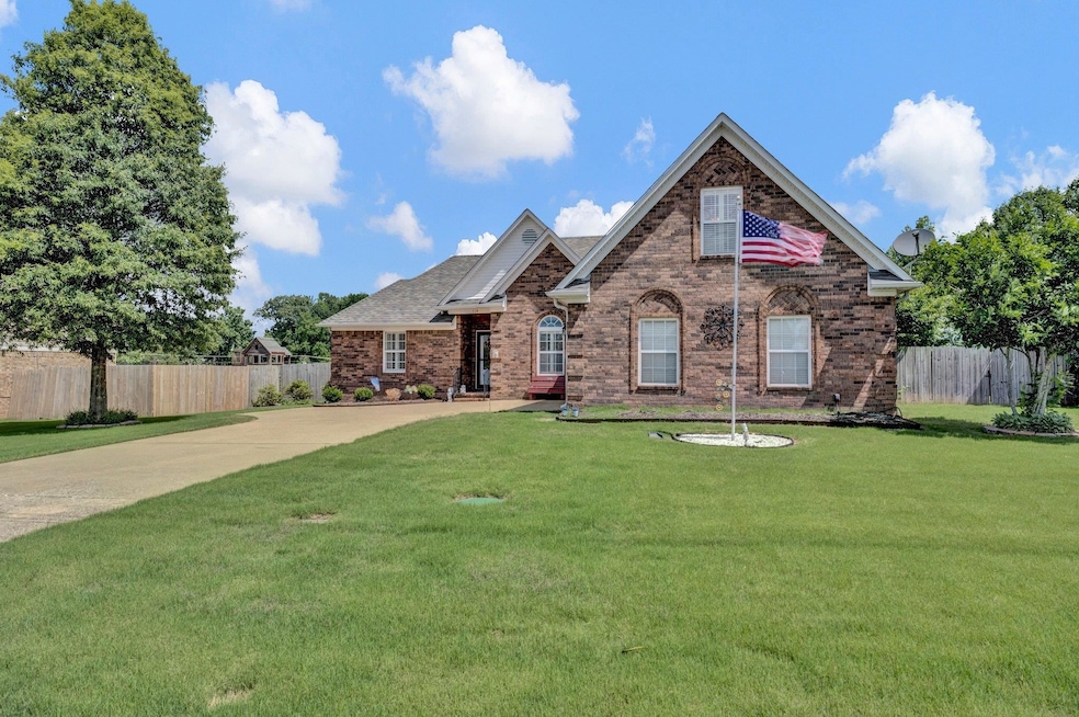 Beautiful one owner home in the HEART OF ATOKA! Great condition. Back yard backs up to Pioneer Park! Playground, walking trail and pond! Around corner to Atoka Elementary and the SPLASH PAD!