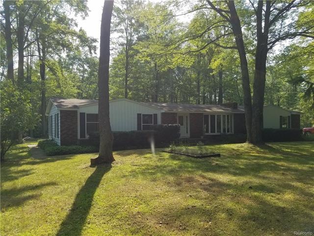 NICE 3 BEDROOM RANCH ON 7.6 WOODED ACRES