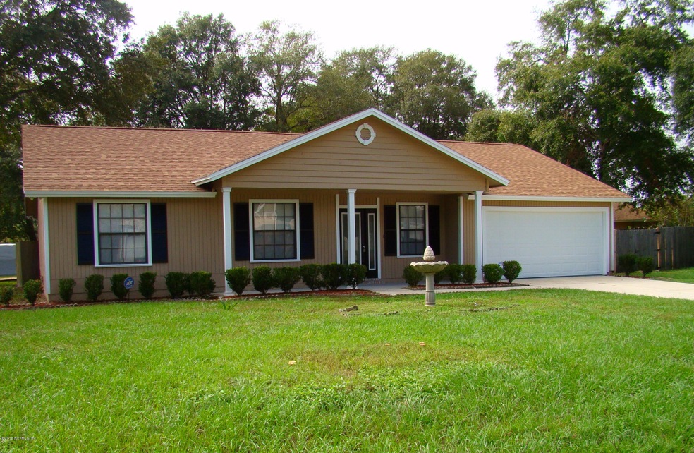 7902 Painted Oak Dr, Jacksonville, FL 32210 - photo 1