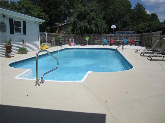 18 x 36 sport pool - sand area at one end for the kids to play - at the beach every day!  Pool area also has water shower head to rinse off before taking a plunge!