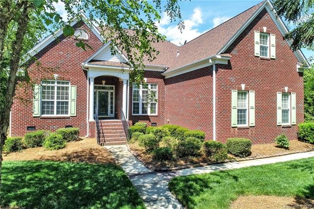 All brick home on 1/2 acre lot, with mature trees 
