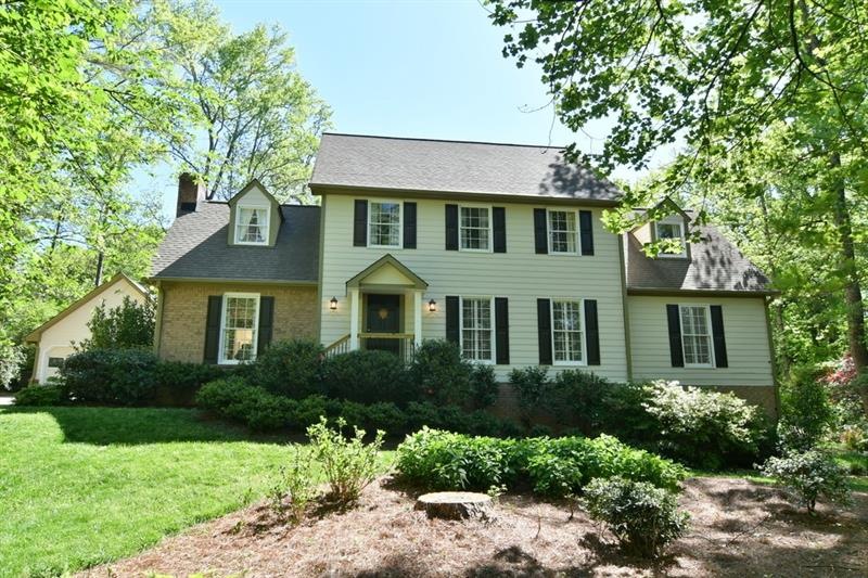 Traditional beauty on over an acre lot with a two 