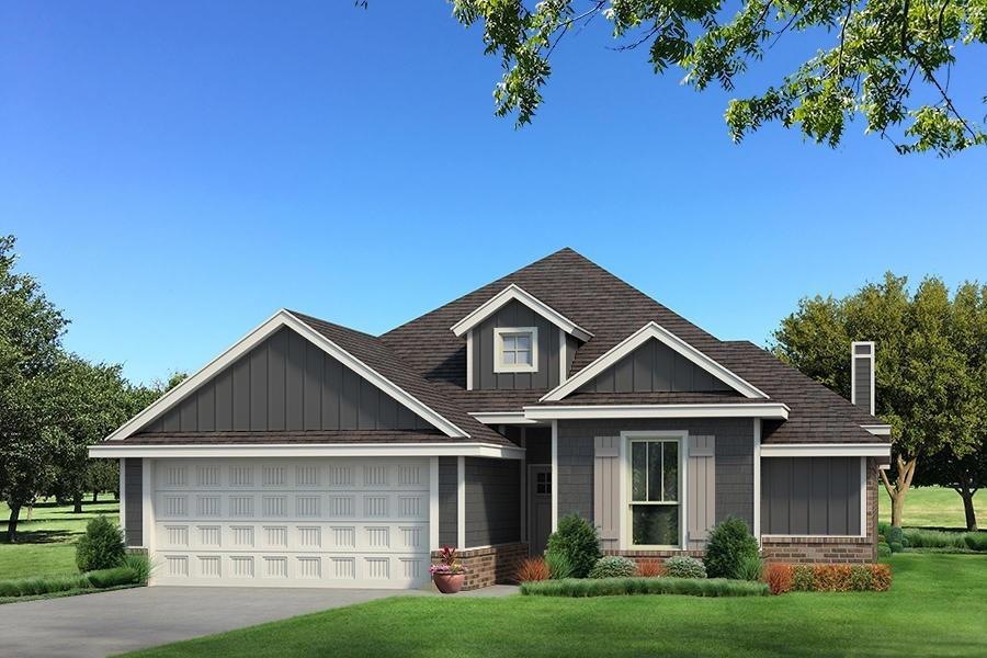 Craftsman-style house featuring a garage and a fro