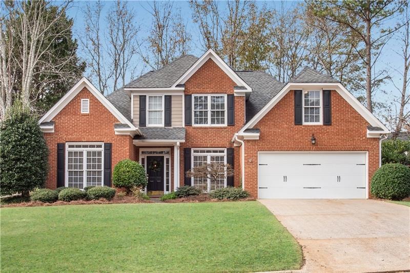 Stately brick front home steps from OAC Amenities