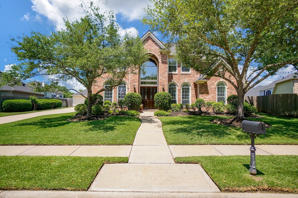 Yes, indeed! There really is such a thing as perfection and this Perry home is it! This palatial 2-story, single family, brick beauty is located at 13307 N. Bend Landing, Cypress, TX, in the highly desirable Coles Crossing community.