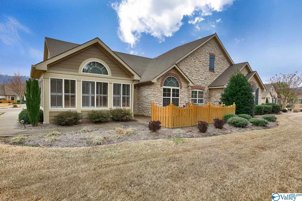 NO EXTERIOR MAINTENANCE!!! Corner lot at end of Cu-de-sac offers plenty of green space and privacy!