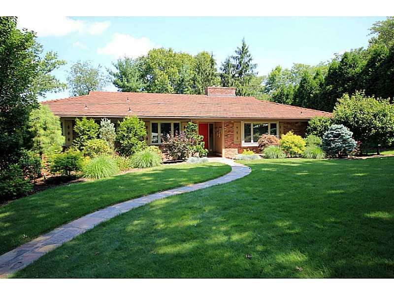 Exterior Front. Level entrance  Tile roof  Sprinkl