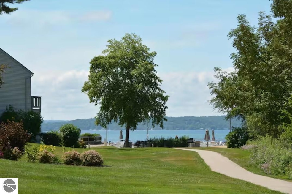 5605 E Creeks Crossing unit 36, Williamsburg, MI 49690 - photo 1